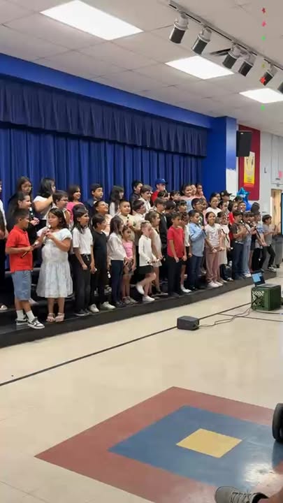 Students get ready to play their recorders on stage