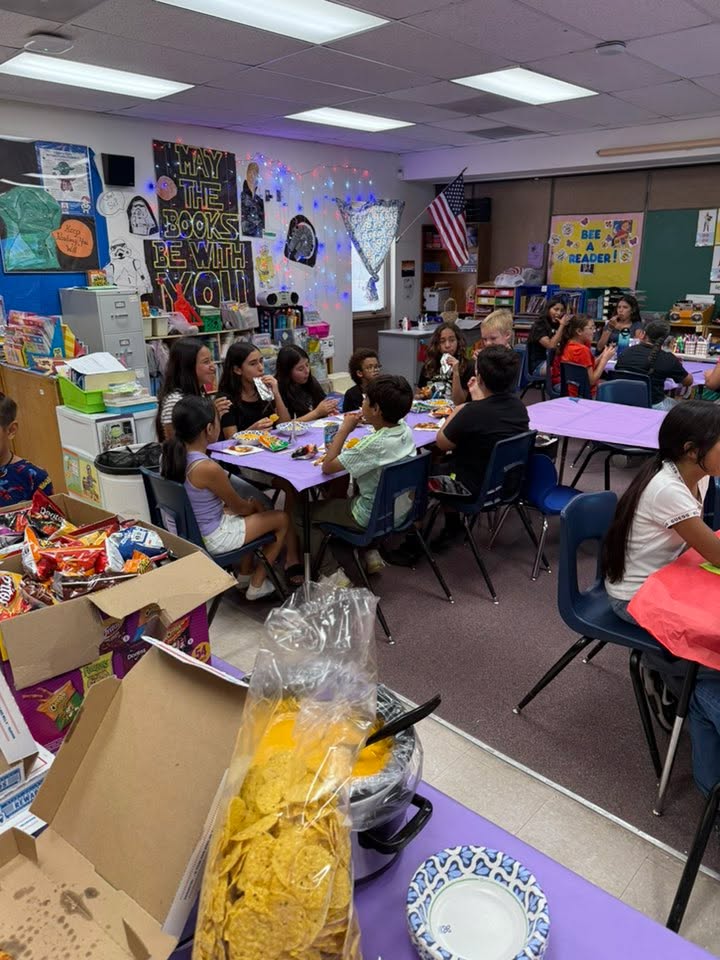 Students enjoy a pizza party